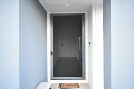 Security door in front of the front door of a house