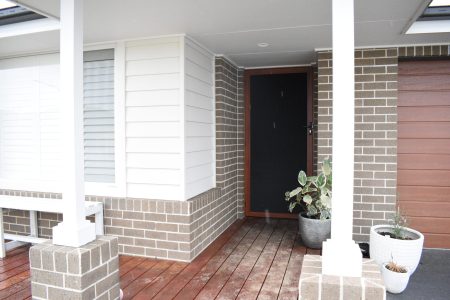 Security door and shutters at front of a house