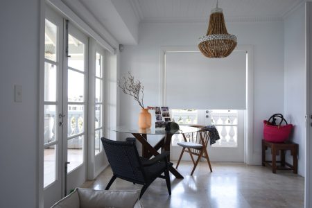 Roller Blinds in a small room with a table