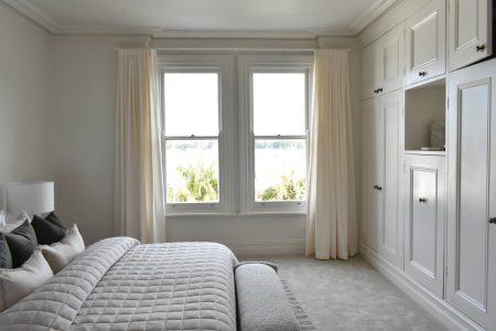 Curtains inside of a bedroom